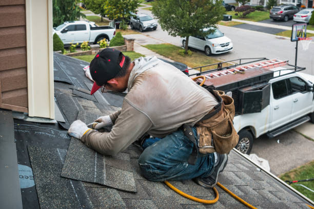 Professional Roofing technician working in Falls City, NE